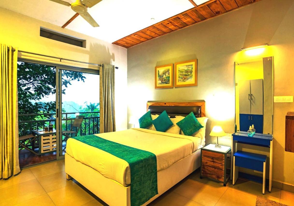Mistletoe Homestay & Cafe Munnar Esterno foto